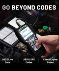 Hand using OBD2 Scanner For ABS And SRS Codes, Check Engine Light Diagnostic Tool With Battery Test, in a car engine bay