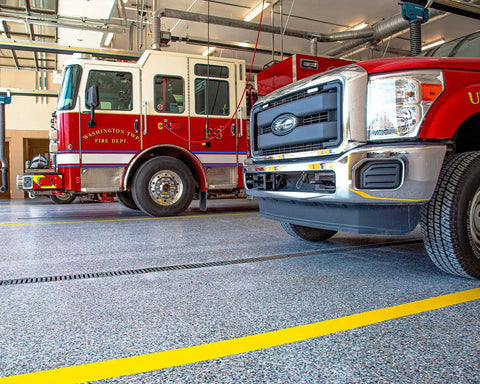 High Solids Polyaspartic Topcoat Kit 2 Gallons Clear Gloss Finish Easy 1 To 1 Mix Ratio UV Abrasion And Scratch Protection For Home And Industrial Floors Durable Smooth Application Long Lasting Shine applied on fire station floor
