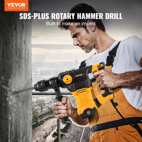 Side view of orange and black VEVOR SDS-Plus rotary hammer drill with auxiliary handle drilling into concrete