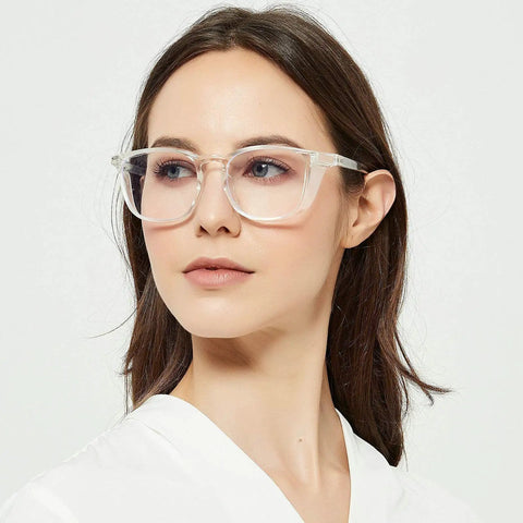Person wearing Lightweight Eye Protection Glasses With Clear No Fog Lenses For Everyday Use Dope Yet Practical Safety Eyewear For Men And Women Durable Protective Glasses In Transparent White Frames