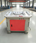 Heavy Duty Industrial Grade Portable Rebar Bender Tool Rugged Steel Rod Bending Machine, front view in workshop setting.