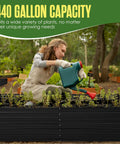 Woman watering plants in Durable Galvanized Steel Raised Garden Bed For Outdoor Gardens 8x4 Feet Open Bottom Planter Box With 440 Gallon Capacity