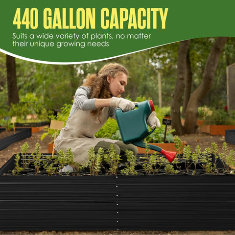 Woman watering plants in Durable Galvanized Steel Raised Garden Bed For Outdoor Gardens 8x4 Feet Open Bottom Planter Box With 440 Gallon Capacity