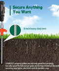 Drill inserting Twenty Pack 8 Inch Screw In Tent Stakes With Beefy Hex Heads Heavy Duty Stainless Steel Ground Anchors into grass.