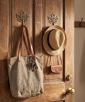 Legit Vintage Maple Leaf Wall Hooks Gold Finish Heavy Duty Decorative Rack Built Tough For Coats And Keys Straight Up Farmhouse Home Organization Two Pack with bags and hat.