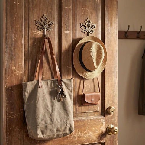 Legit Vintage Maple Leaf Wall Hooks Gold Finish Heavy Duty Decorative Rack Built Tough For Coats And Keys Straight Up Farmhouse Home Organization Two Pack with bags and hat.