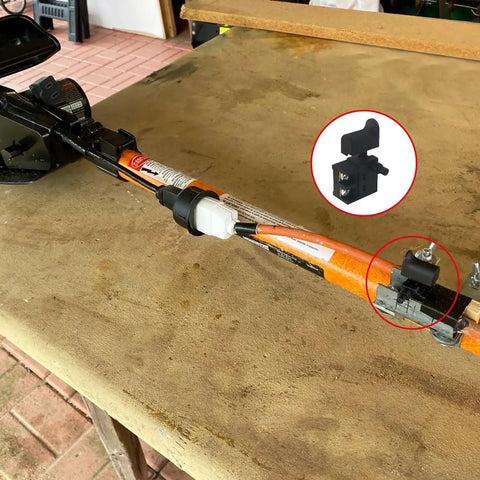 2 Pack Hammer Trigger Power Tool Switches With Pushbutton 6A 110 Type installed on orange power tool handle
