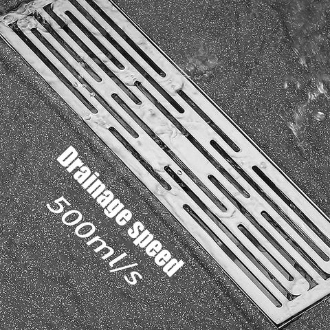 Heavy Duty 304 Stainless Steel Rectangular Linear Shower Drain Grate With Built In Hair Strainer For Bathroom Floors, close-up showing drainage speed.