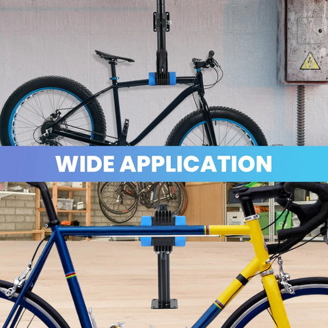 Wall Mounted Bicycle Repair Stand With Adjustable Clamp holding road and mountain bikes in a garage setting