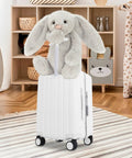 Underseat Carry On Luggage For Kids With Wheels TSA Approved Ride On Suitcase in playroom with plush toy on top