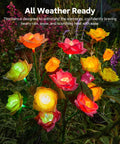 Solar Garden Lights Outdoor Decorative 3 Pack Rose Flower Pathway Lights With 7 Color Changing LEDs glowing in rain
