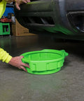 Heavy Duty 4 Gallon Oil Drain Pan With Pour Spout And No Splash Lip, shown under a vehicle