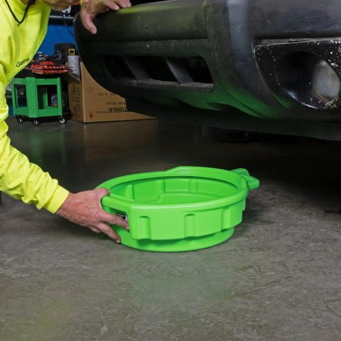 Heavy Duty 4 Gallon Oil Drain Pan With Pour Spout And No Splash Lip, shown under a vehicle