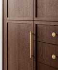 Champagne Bronze Cabinet Knobs Set 1.1 Inch Diameter Zinc Alloy Drawer Pulls installed on brown wooden cabinets.