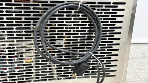 Power cord behind Top Shelf Heavy Duty Commercial Blast Freezer 241 Liter Capacity Stainless Steel Build Rapid Chill Down To Minus 39 Degrees.