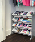 4-tier toy organizer with 12 bins in grey and white, placed in a playroom closet, part of 12 Bin Toy Storage Organizer For Kids Playroom