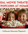 Two children smiling with a large bowl of popcorn from the Premium Stainless Steel Stove Top Popcorn Maker With Patented Stirring Gears.