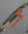 Heavy Duty Ratchet Load Binders Two Pack With Fold Down Safety Handles, black chain, orange ratchet, securing cargo.