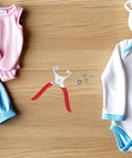 Sturdy Stainless Steel Snap Fasteners Kit Setter Tool With Five Claw Designed For Easy Garment Repairs And Craft Projects, This All In One Handy Fastener Installer Keeps Your Clothes Secure And Looking Fresh. red handled pliers with snap buttons on baby clothes