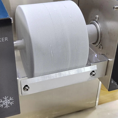 Heavy Duty Commercial Snow Cone Shaver Grinding Down Ice Blocks To Whip Up 198 Pounds Of Silky Shaved Flakes Daily With Tough Steel Cutters And Dependable Air Cooling For Street Vendors And Dessert Shops, showcasing steel drum in action.