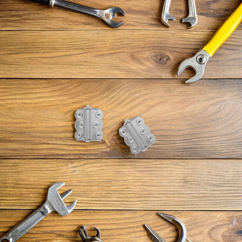 Self Closing Stainless Steel Spring Door Hinges With Screws on wooden table with tools