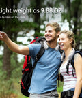 Couple hiking with Portable Neck Fan With 5 Speed Settings Hands Free Wearable Bladeless Personal Cooling Fan in forest.