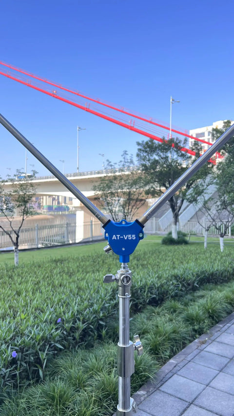 Grab And Go Portable Ham Radio Antenna Kit With Tripod For 7 To 430 MHz Inverted V Design set up outdoors near a bridge