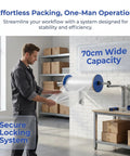 Man using Straight Up Wall Mount Bubble Wrap Dispenser And Rock Solid Foam Roll Holder For Pro Level Packing Stations.