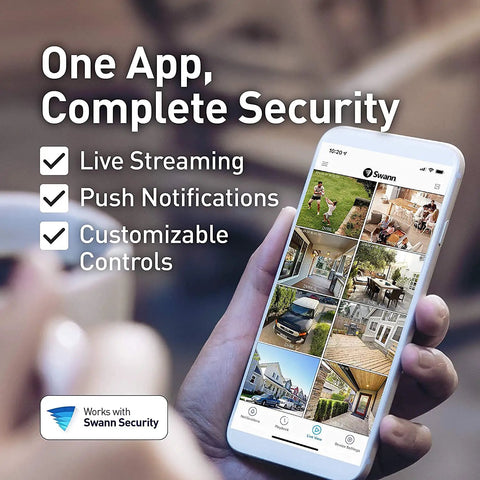 Hand holding phone displaying security camera feeds, text 'One App, Complete Security', compatible with Swann Security services.