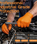Person using Super Heavy Duty Nitrile Work Gloves 8 Mil Thick Industrial Mechanics Disposable for auto repair tasks.