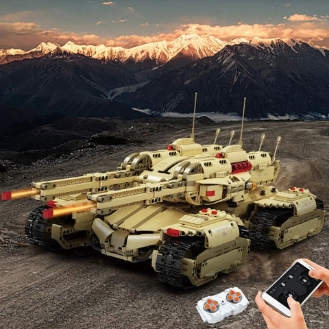 Ultra Realistic Remote Control Military Mammoth Tank Kit With 3296 Pieces, desert terrain, remote control in hand, dark skies.
