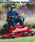 Man using red zero-turn mower on grass with Flat Free 13x6.50-6 Lawn Mower Tires and Wheel Set for Zero Turn Mowers
