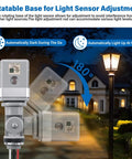 Two Pack Photocell Sensor For Outdoor Lighting, 120V AC, 50/60 Hz, IP54 Waterproof, shown with rotatable base in yard.