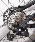 Close-up of Ultra Light 8 9 10 11 12 Speed Bike Cassette for Mountain Road XC DH AM with 11 to 52T range on bike wheel.