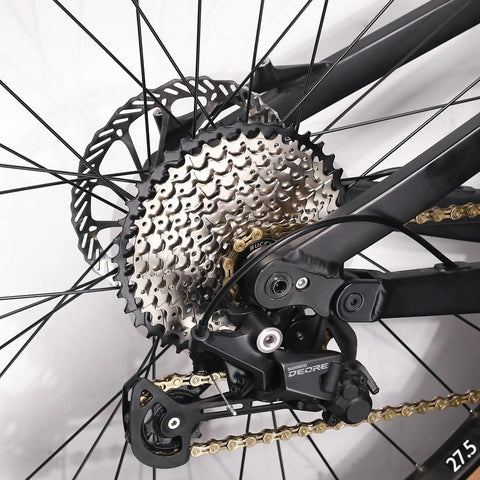Close-up of Ultra Light 8 9 10 11 12 Speed Bike Cassette for Mountain Road XC DH AM with 11 to 52T range on bike wheel.