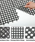 50 Pack Interlocking Drainage Mats 11.8 By 11.8 Inches Non Slip TPE Floor Tiles With Drain Holes For Bathroom Kitchen Patio Pool Deck And Garage No Brainer Easy Splice Cushioned Anti Fatigue Surface, showing hand interlocking gray tiles.