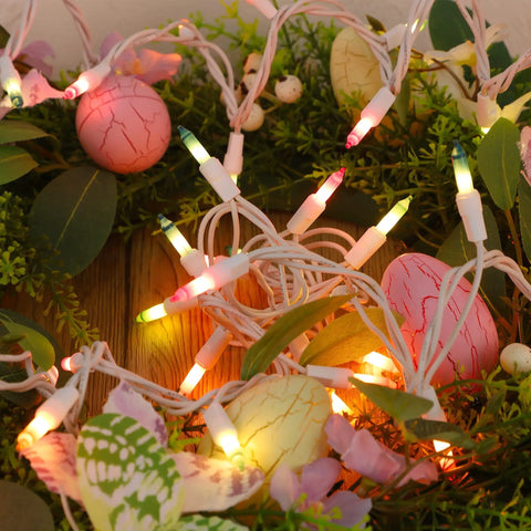 Close-up of Two Pack Easter Fairy Lights Set With 100 Mini Pastel Bulbs On 20 Ft White Wire Multicolor 120V UL Certified, in wreath.