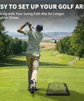 Golfer practicing drive with All-In-One Golf Hitting Mats Trainer For Driving, Chipping And Putting on a golf course