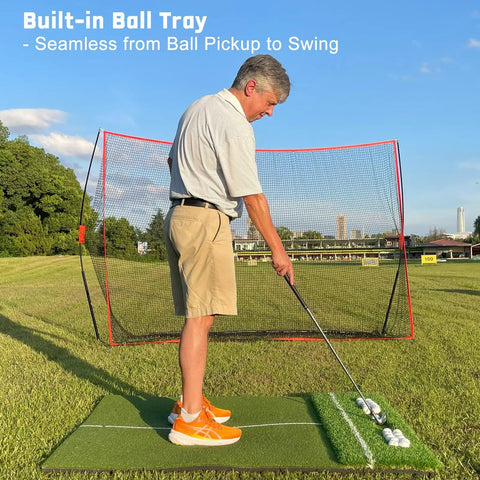 Man practicing on Oversized 6x4ft Golf Hitting Mat With Built In Ball Tray Dual Turf for Indoor and Outdoor Practice Works With Golf Simulators
