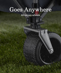 Close-up of XL Collapsible Wagon Heavy Duty 400 Lb Capacity With 50 Gallon Utility Cart All Terrain Wide Base Wheels on grass.
