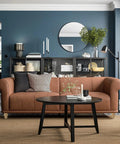 Living room with brown sofa featuring 4 Inch Unfinished Bun Feet For Couch, Sofa, Cabinet And Ottoman, enhancing modern decor.