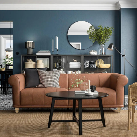Living room with brown sofa featuring 4 Inch Unfinished Bun Feet For Couch, Sofa, Cabinet And Ottoman, enhancing modern decor.