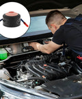 Ultra Compact Auto Deploy Heat Sensor Aerosol Fire Extinguisher For Your Daily Ride Dash Or Engine Bay Safe 10G Peel Stick Mount being installed in a car engine bay.