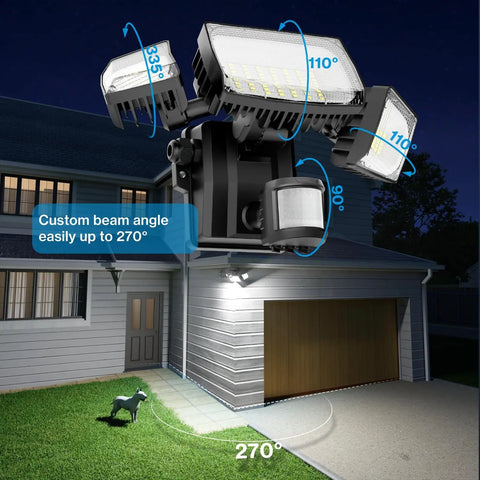 70W Motion Sensor Plug In Outdoor Flood Light installed on house wall illuminating driveway, showing adjustable angles and wide coverage