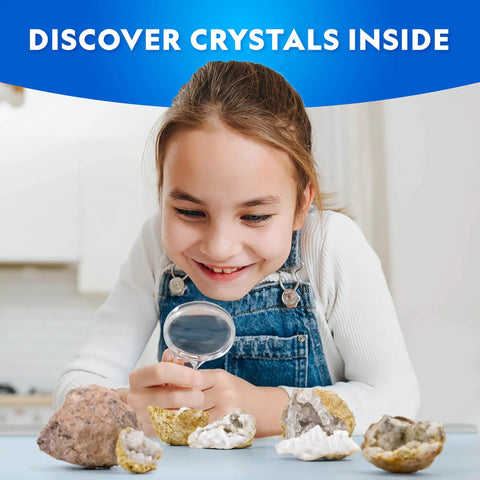 Child examining cracked geodes with magnifying glass from Break Open Four Geodes Science Kit With Goggles And Display Stand For STEM Learning A Totally Awesome Gift For Kids Break Your Own Crystals And Minerals To Discover Amethyst Quartz Gems.