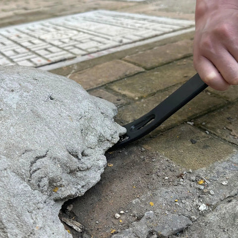 Using Four Piece Flat Pry Bar Set Featuring Five And Quarter Inch, Seven Inch, Twelve Inch, And Fifteen Inch Heavy Duty Nail Pullers for concrete removal