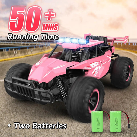 Remote Control Monster Truck For Kids With Crazy Long Battery Life 50 Minute Playtime 1 12 Scale 13 Inch All Terrain RC Truck With Flashing Chassis Lights 20 Kmh Speed Great Gift For Girls And Boys, pink monster truck with extra batteries on a road