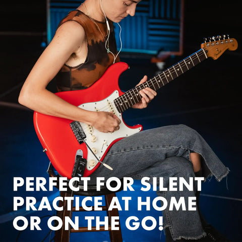 Person playing guitar using Mustang Micro Plus Headphone Amplifier With Bluetooth Streaming, 25 Amp Models and 25 Effects