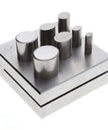 Oval Disc Cutter Set With Seven Punches And Die For Soft Metal Up To 14 Gauge, metal tool shown with punches and die on a steel base.