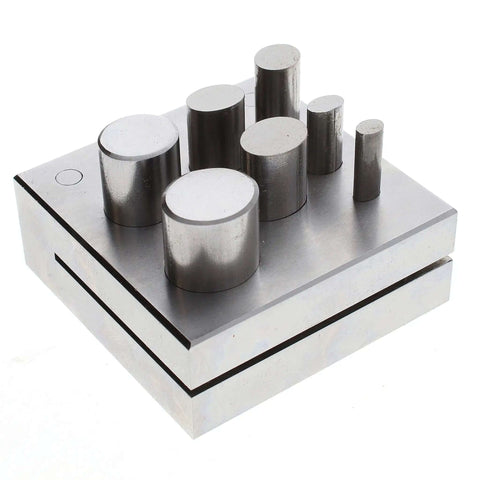 Oval Disc Cutter Set With Seven Punches And Die For Soft Metal Up To 14 Gauge, metal tool shown with punches and die on a steel base.